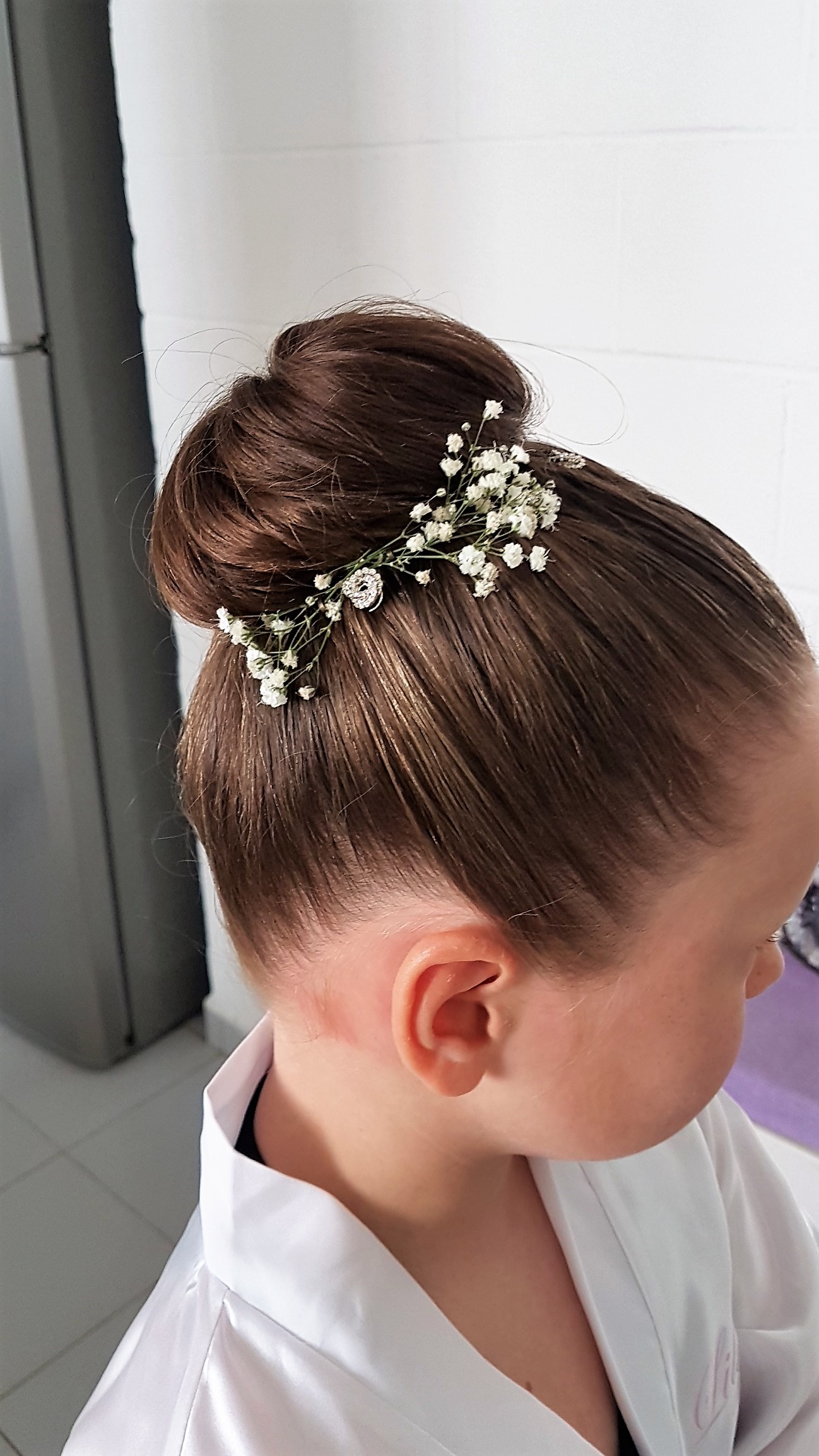 Braided Updo With Flower Hair Clips