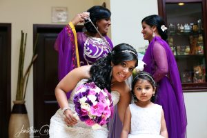 Flower girl and bride hairstyles in Tulum, Mexico by Doranna Wedding Hairstylist & Bridal Makeup Artist