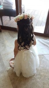 Romantic flower girl hairstyle with floral crown by Doranna Wedding Hairstylist & Bridal Makeup Artist in Mexico