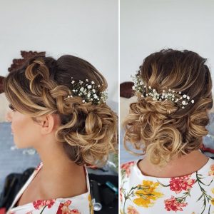 Braided low bun hairstyle by Doranna Wedding Hairstylist & Bridal Makeup Artist in Akumal, Mexico