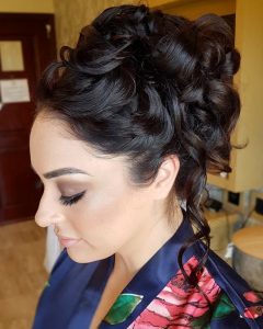 Bridal high bun with curls by Doranna Wedding Hairstylist & Bridal Makeup Artist at Grand Palladium Colonial