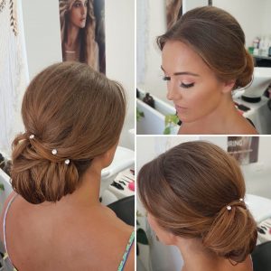 Elegant wedding low bun with rhinestones by Doranna Wedding Hairstylist & Bridal Makeup Artist in Riviera Maya, Mexico