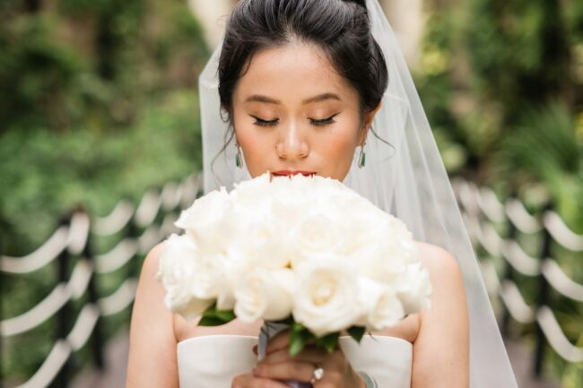 Asian bridal makeup at Occidental Xcaret by Doranna Hairstylist & Makeup Artist. Ocean Photo