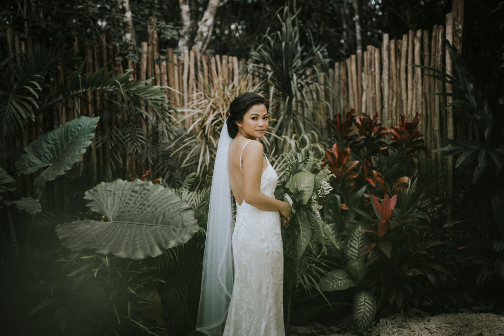 Chic bridal updo in Tulum, Mexico by Doranna Hairstylist