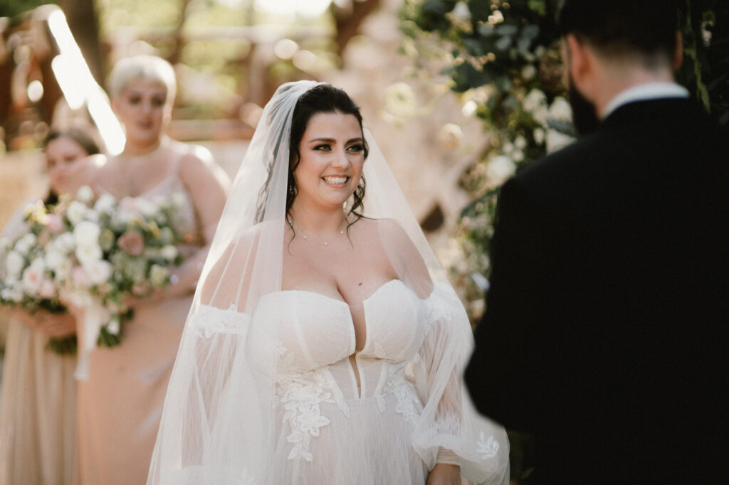 Half-Up, Half-Down bridal hairstyle at Hotel Xcaret Wedding in Mexico by Doranna Hairstylist & Makeup Artist