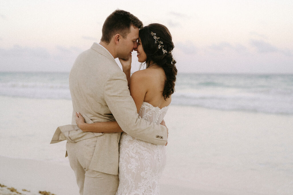 Boho braided bridal hairstyle for strapless beach wedding dress. Look by Doranna Hair & Makeup in Mexico